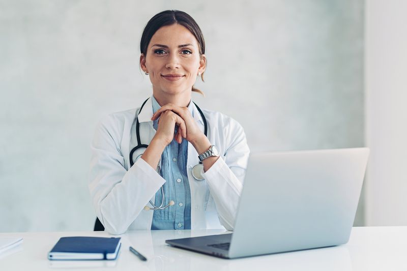 Female doctor and laptop