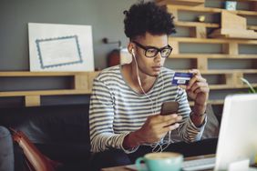 Young borrower activating his new student credit card
