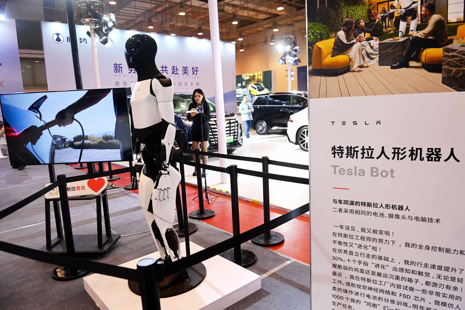 A Tesla humanoid robot is displayed at the 16th Shandong International Auto Show 2024 in Qingdao, Shandong province, China, December 13, 2024.