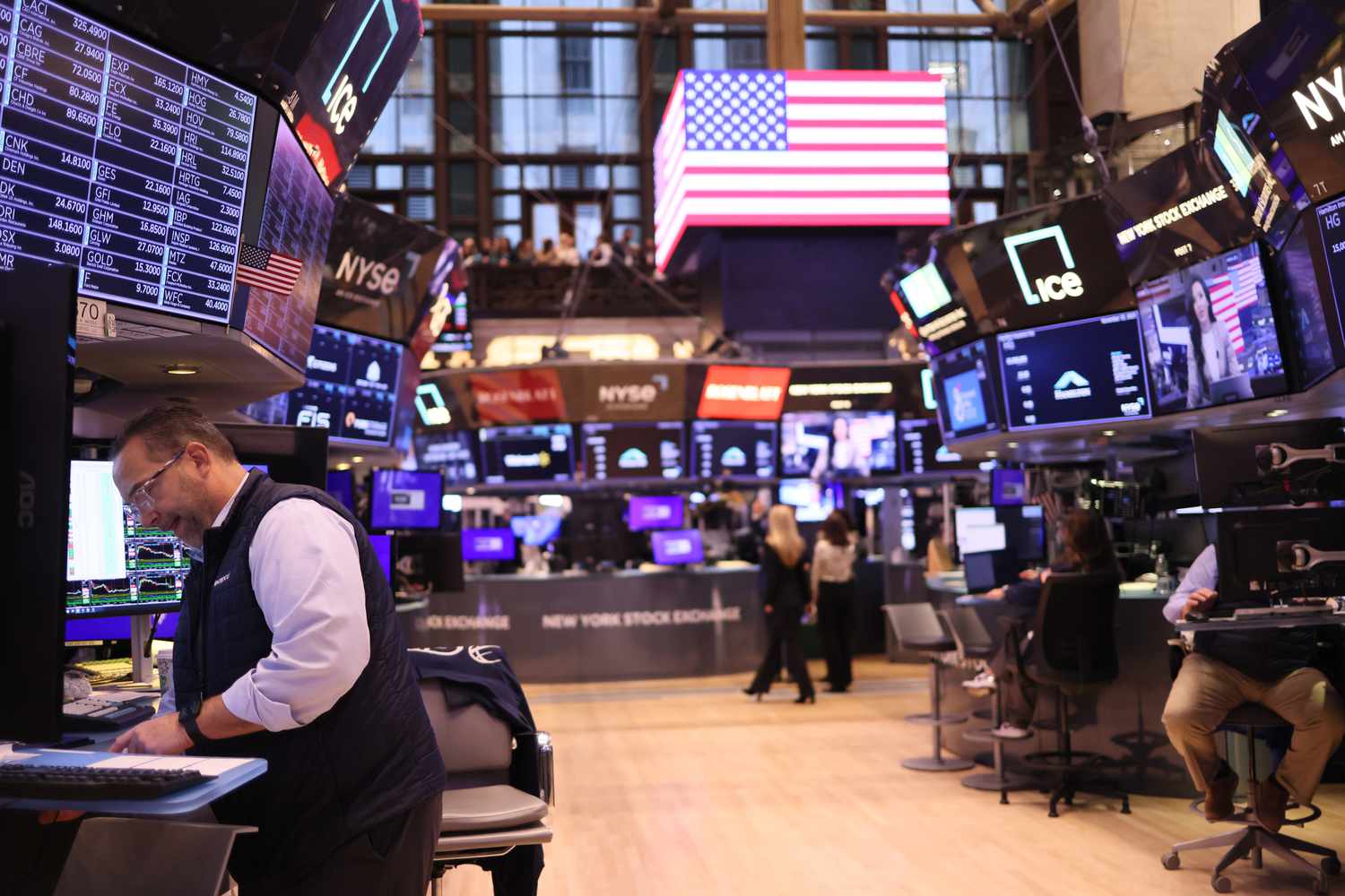 Traders work on the floor of the New York Stock Exchange.