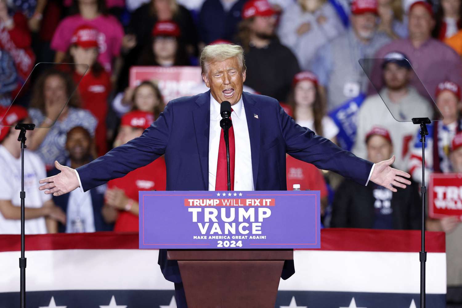 Former US President and Republican presidential candidate Donald Trump speaks during a campaign rally at Van Andel Arena in Grand Rapids, Michigan on November 5, 2024.