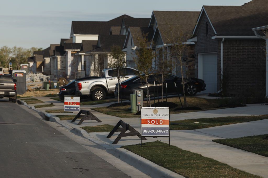 "Sold" signs outside of a home in San Marcos, Texas, US, on Tuesday, March 12, 2024.
