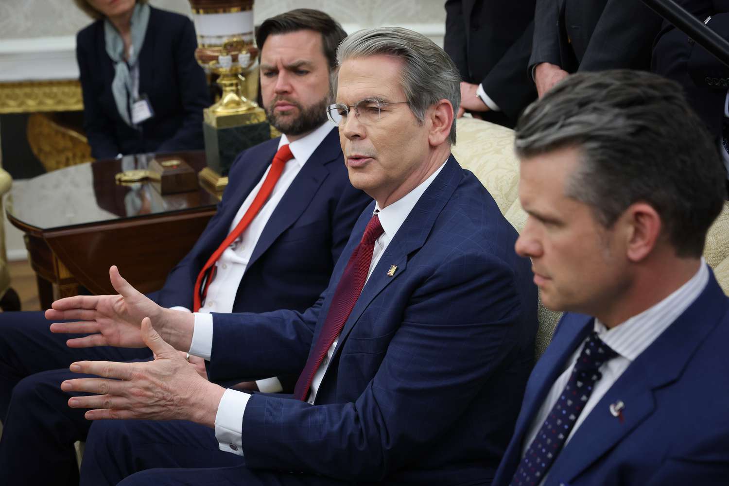 Treasury Secretary Scott Bessent speaks on a pending minerals agreement with Ukraine as he, Vice President JD Vance (L) and and Defense Secretary Pete Hegseth (R) join U.S. President Donald Trump and Italian Prime Minister Giorgia Meloni in the Oval Office at the White House on April 17, 2025 in Washington, DC.