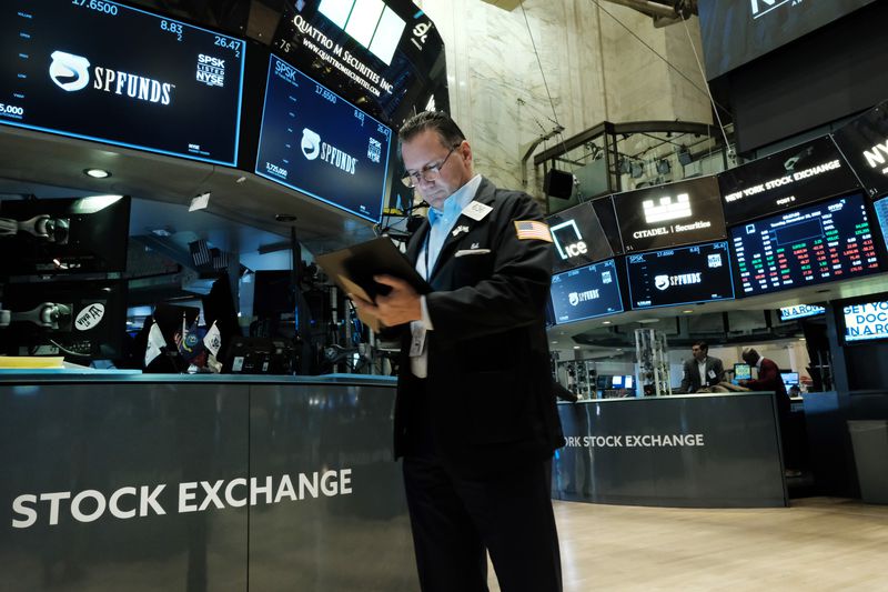 Man standing at the New York Stock Exchange