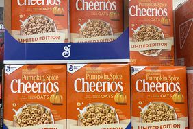 A shelf of orange boxes of Pumpkin Spice Cheerios are seen in a grocery store.