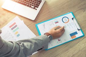 investor looking at portfolio information