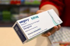 Wegovy box held in hand.