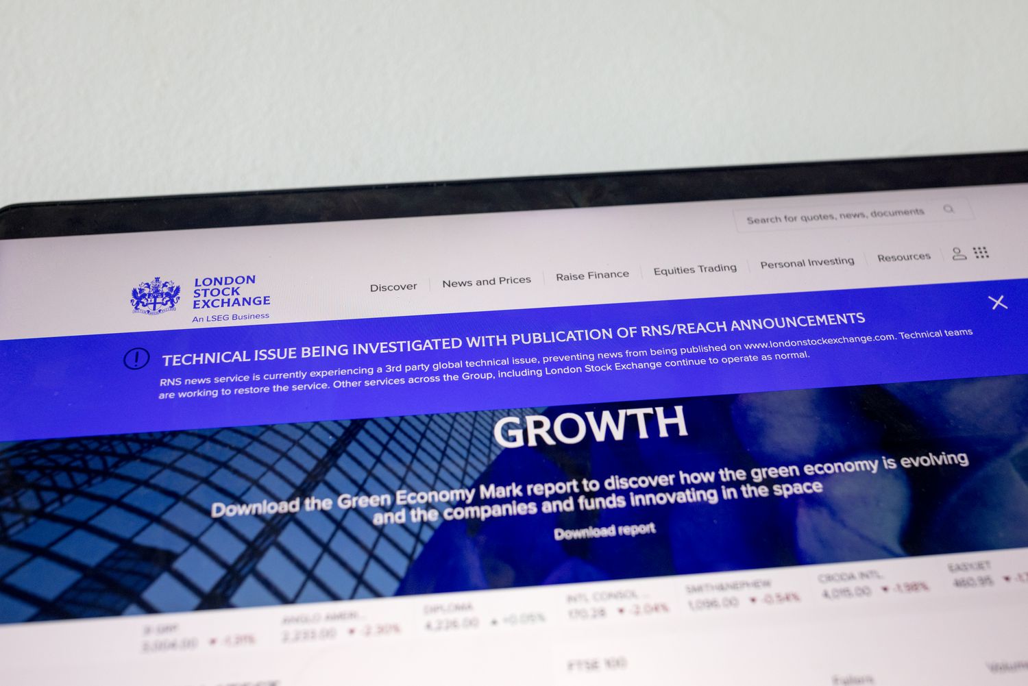 A computer screen displays a London Stock Exchange announcement of technical issues being investigated due to an IT outage on July 19, 2024 in London, UK