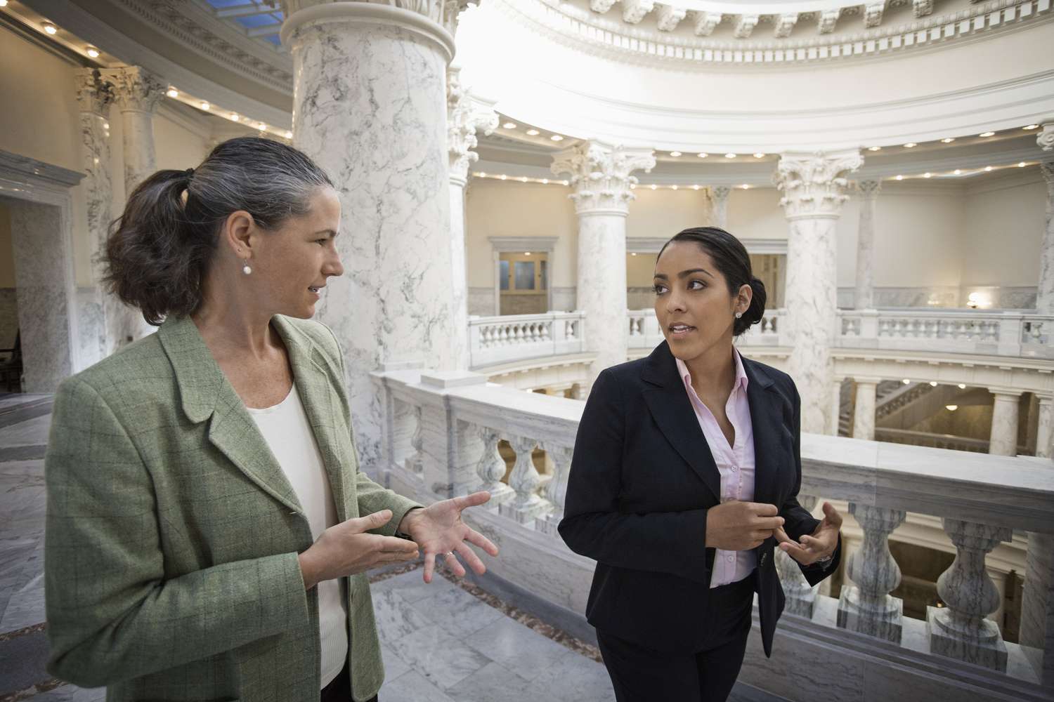 Politicians talking in government building