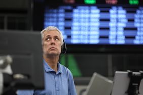 Traders work in the S&P options pit at the Cboe Global Markets exchange