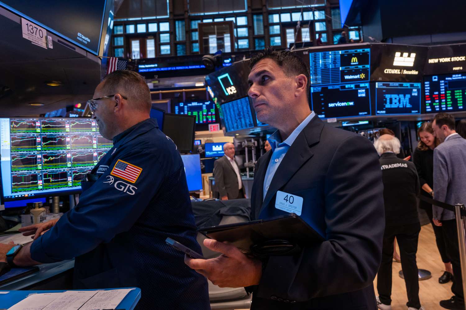 Traders work on the New York Stock Exchange 