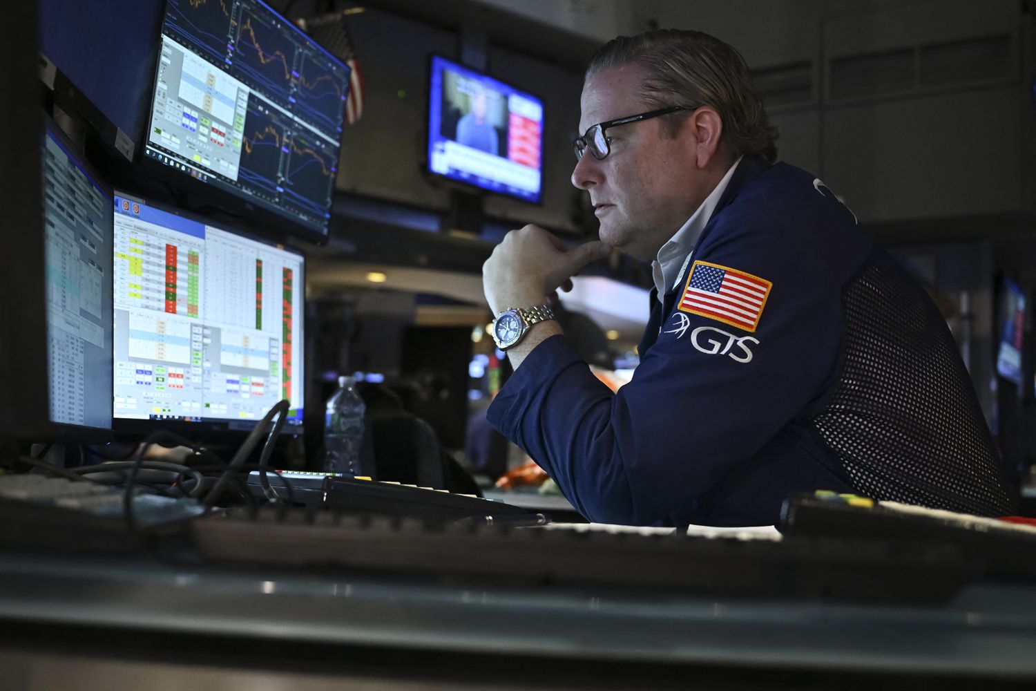 Traders work on the floor of the New York Stock Exchange.
