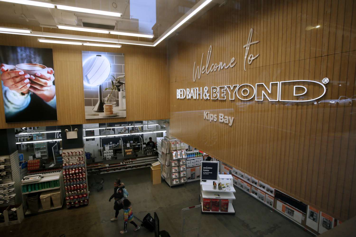 People walk in a New York City Bed Bath and Beyond location on Jan. 11.