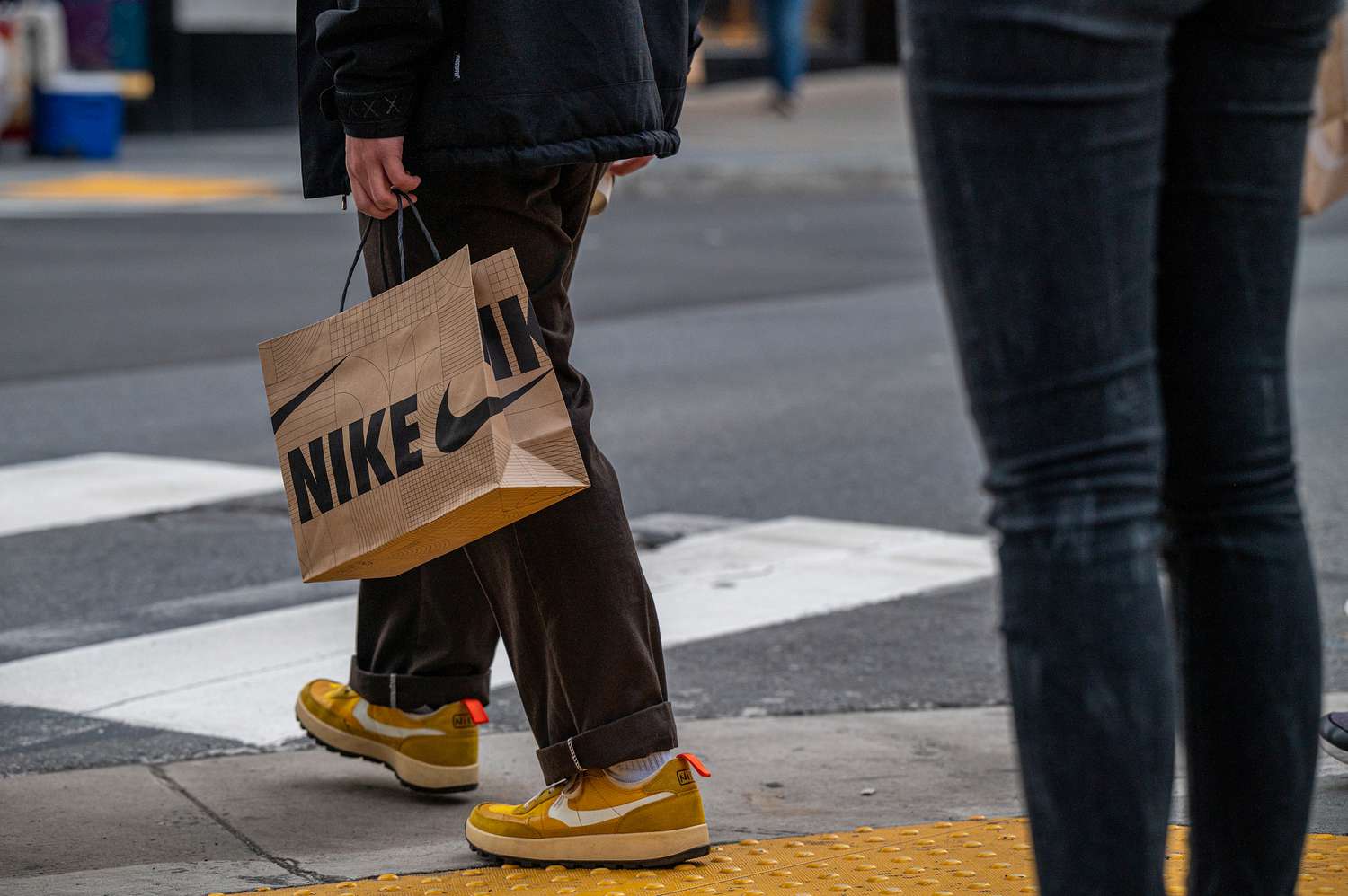 Nike shopping bag in San Francisco, California, US