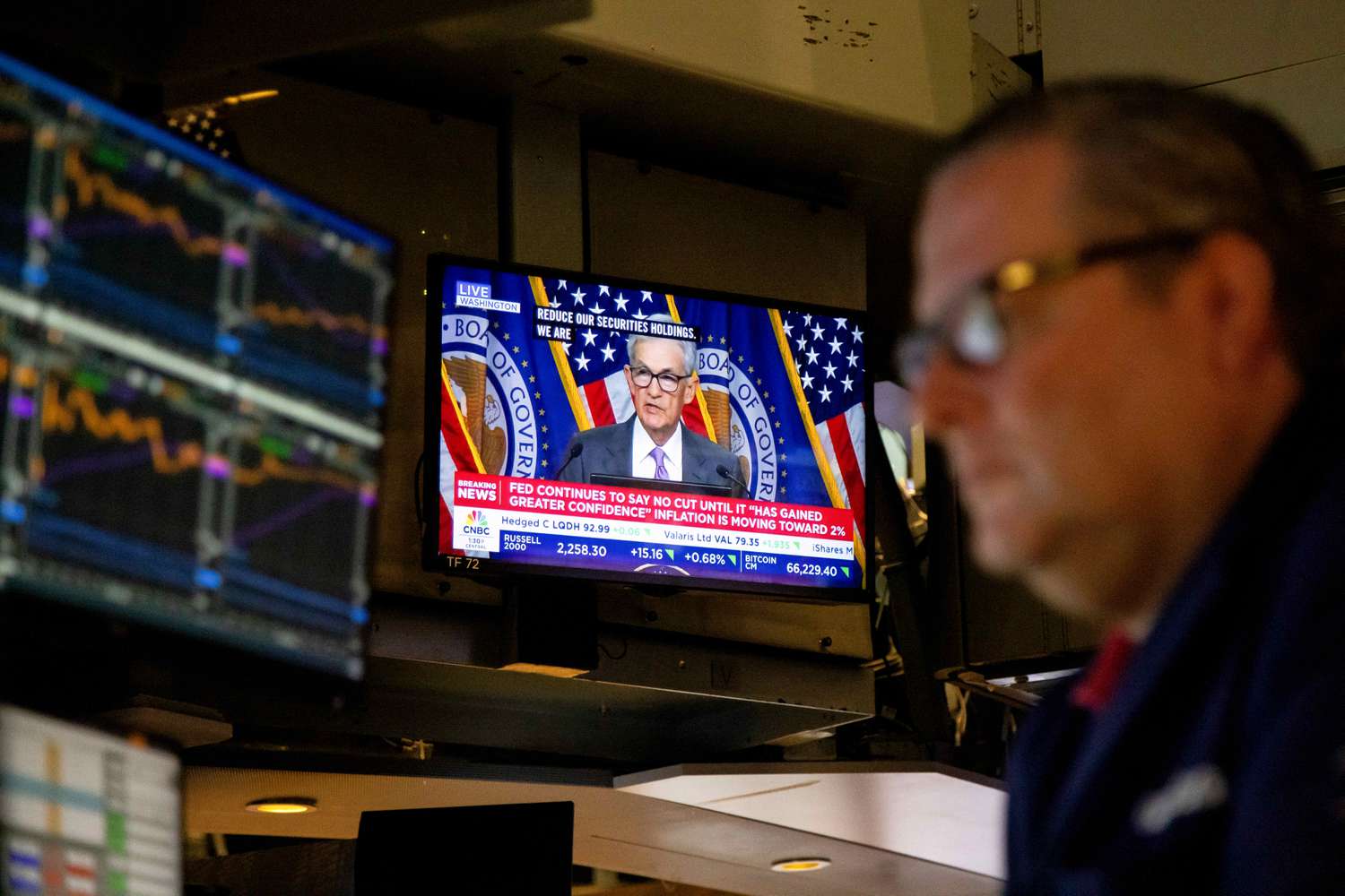 A television station broadcasts Jerome Powell, chairman of the US Federal Reserve, speaking after a Federal Open Market Committee (FOMC) meeting on the floor of the New York Stock Exchange (NYSE) in New York, US, on Wednesday, July 31, 2024