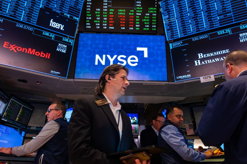Traders work on the New York Stock Exchange 