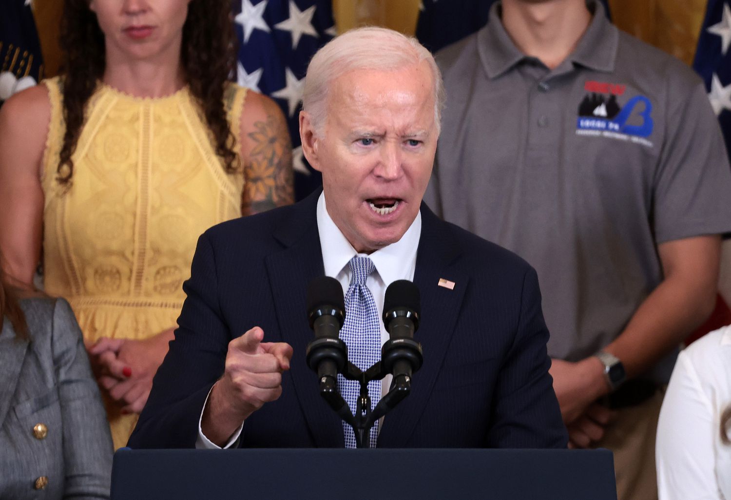 President Joe Biden delivers remarks on the first anniversary of the Inflation Reduction Act in the East Room at the White House on August 16, 2023 in Washington, DC. The Inflation Reduction Act aims to curb inflation by reducing the federal government budget deficit, lowering prescription drug prices, and investing into clean domestic energy programs.