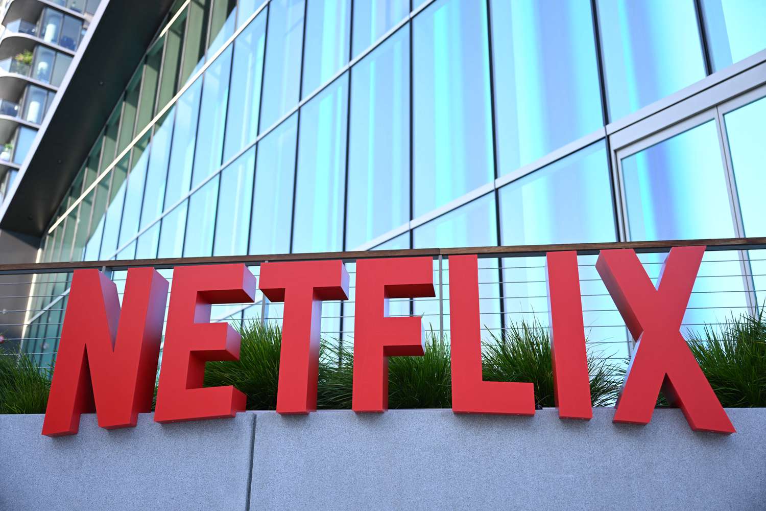 Netflix logo is seen on the side of the Netflix Tudum Theater in Los Angeles,