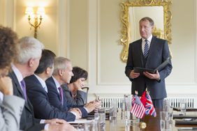 Businessman Talking in Meeting