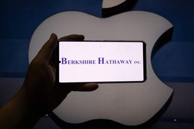Photo taken on August 5, 2024 shows the logos of Warren Buffett's Berkshire Hathaway Inc and Apple Inc in Shanghai, China