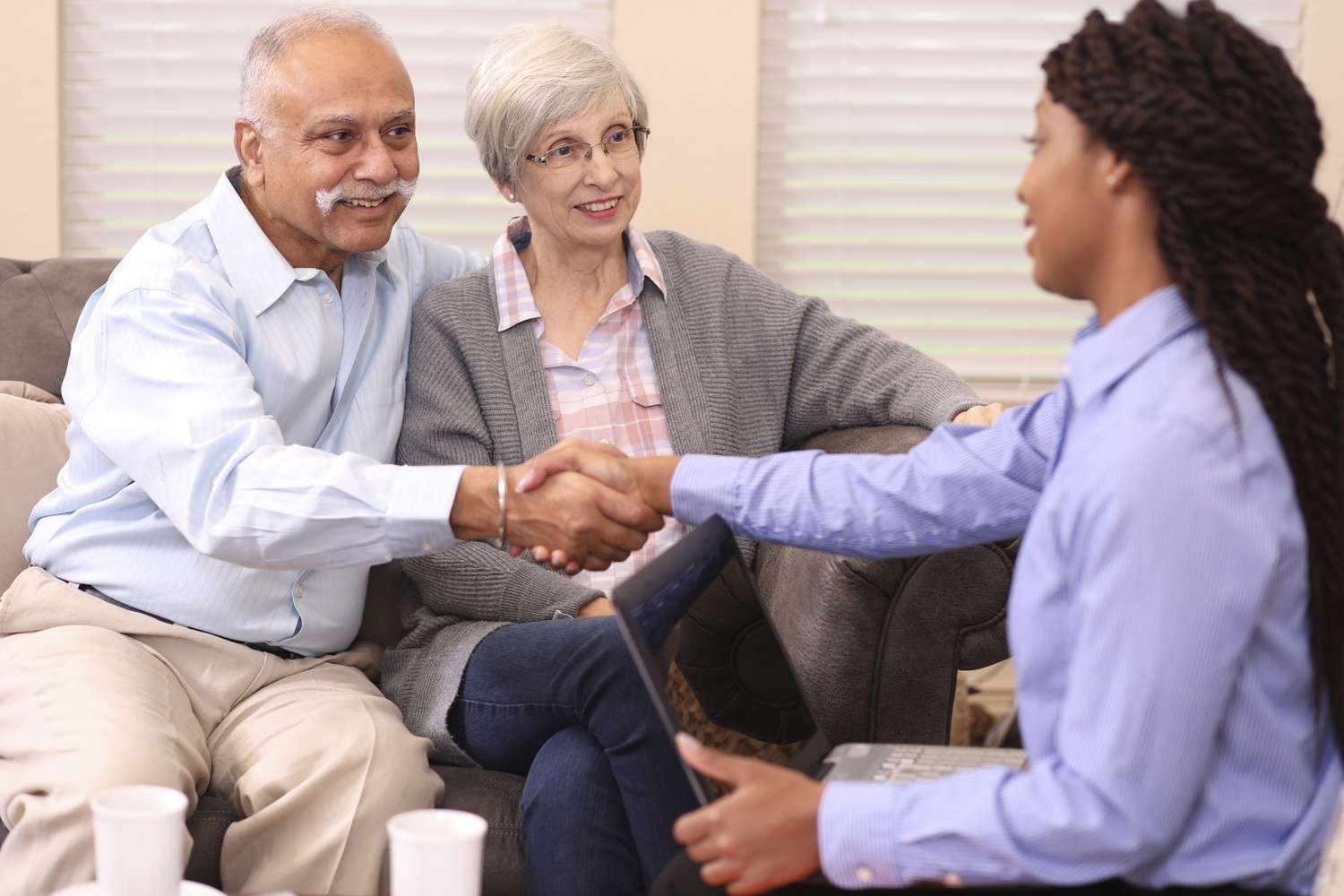 Older couple meeting with financial advisor