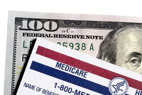 $100 bill and Medicare card