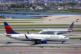 A Delta plane and an American Airlines plane.