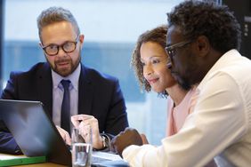 Financial advisor having a meeting with clients