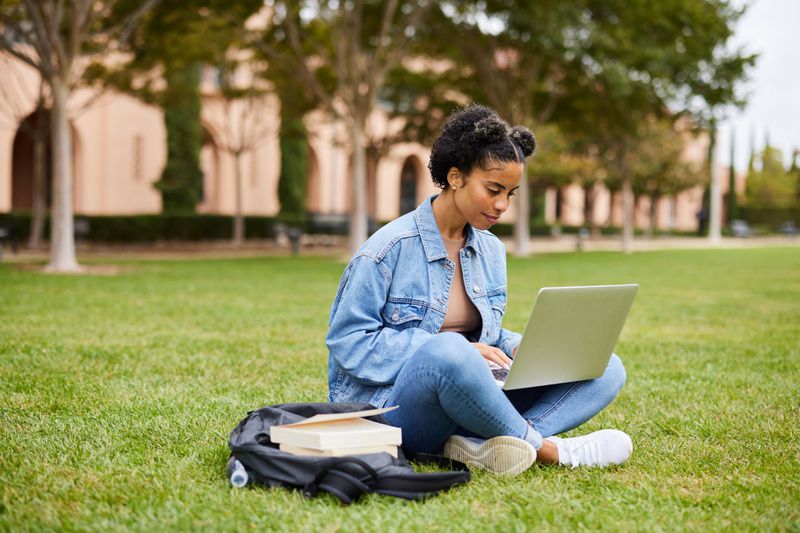 A student studies on campus.