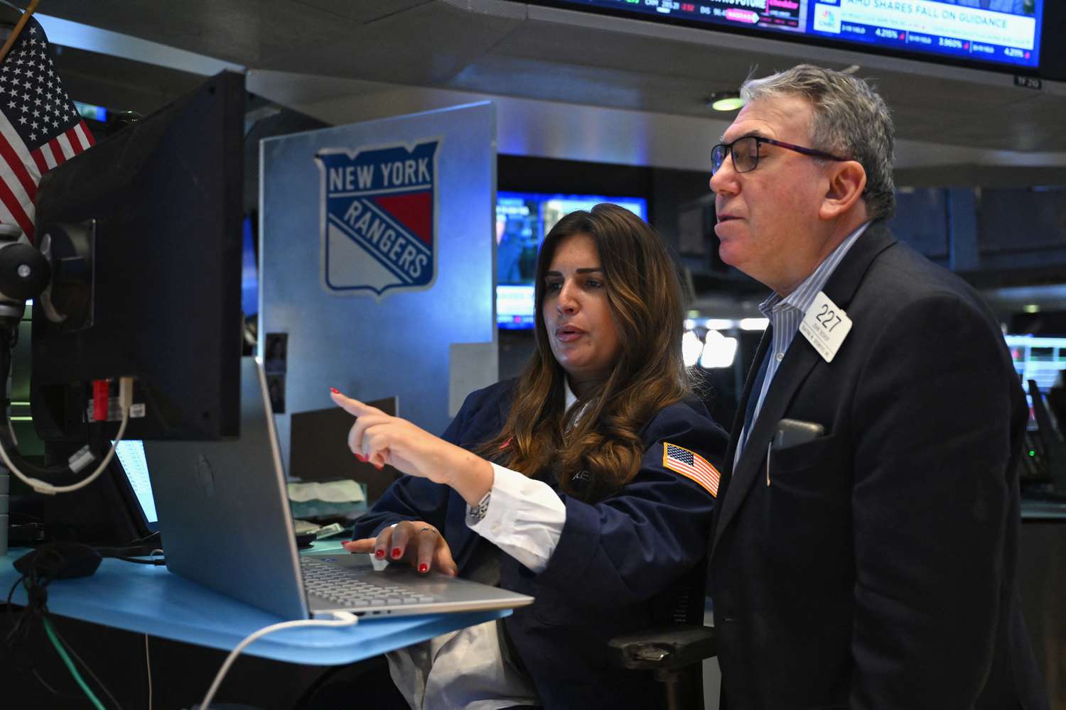 Traders work the floor during morning trading at the New York Stock exchange (NYSE).