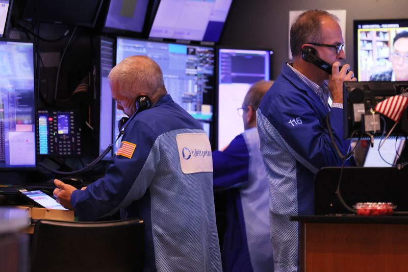 Traders on the floor of the NYSE