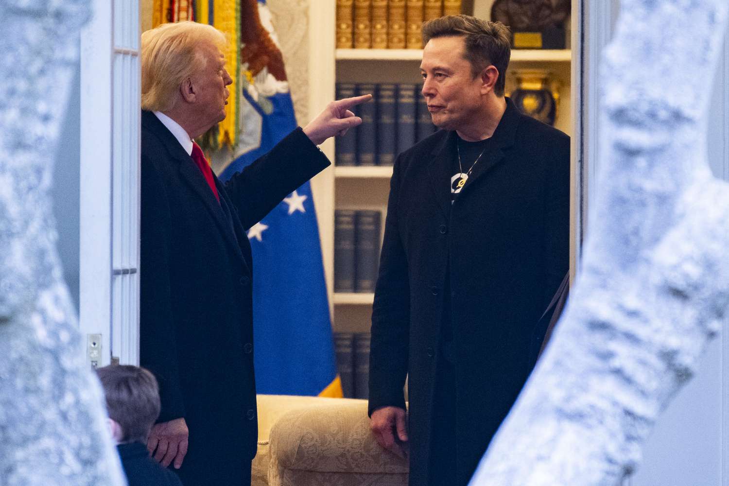 President Donald Trump speaking with Tesla CEO Elon Musk at the White House on March 14, 2025.