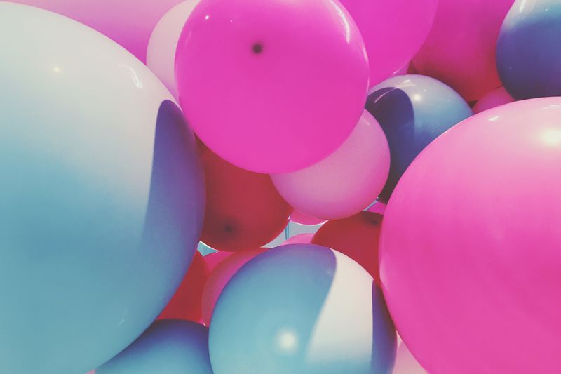 multi-colored balloons bunched together