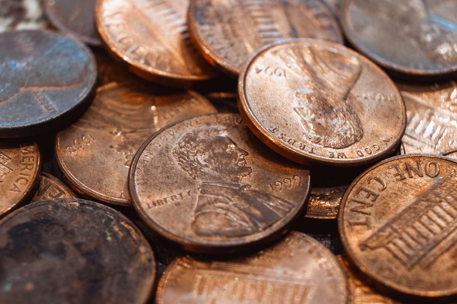 A close-up view of a pile of pennies. 