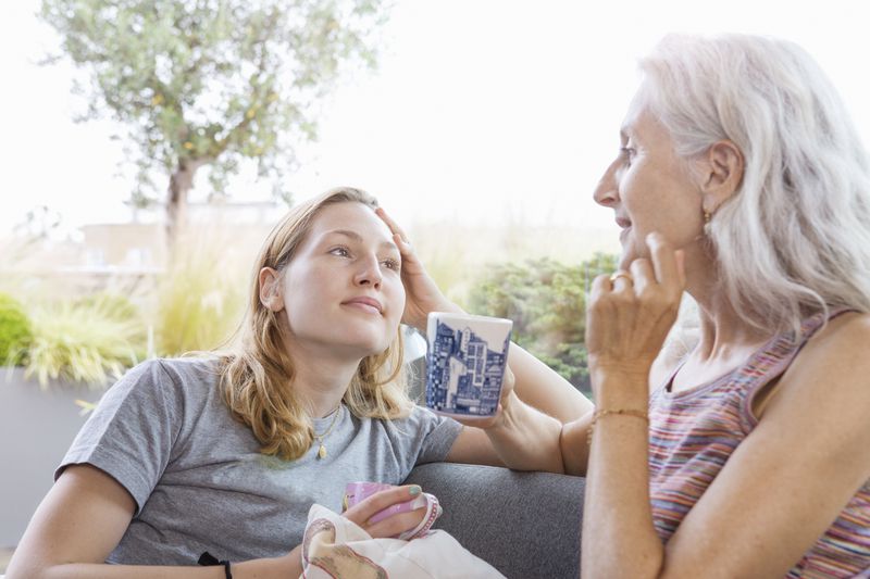 Young Adult Talks to Older Adult