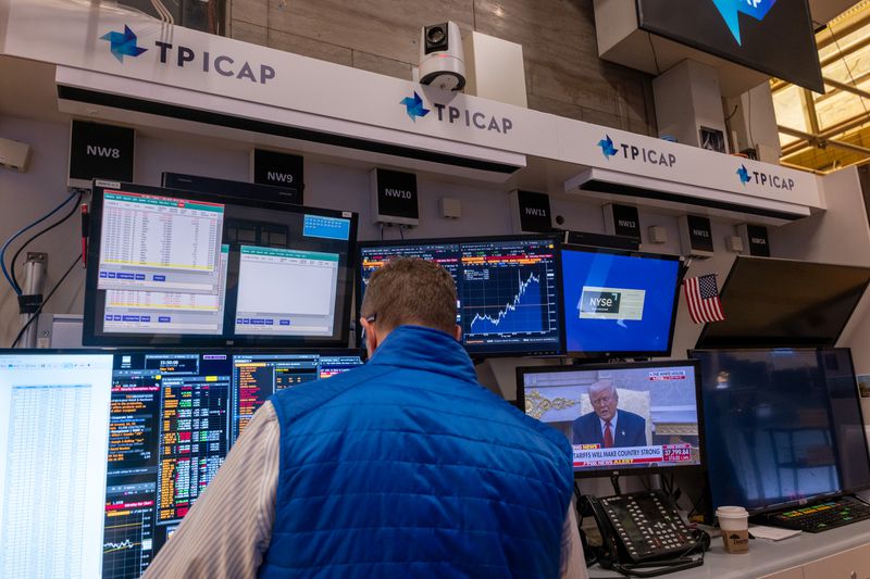 Traders work on the floor of the New York Stock Exchange