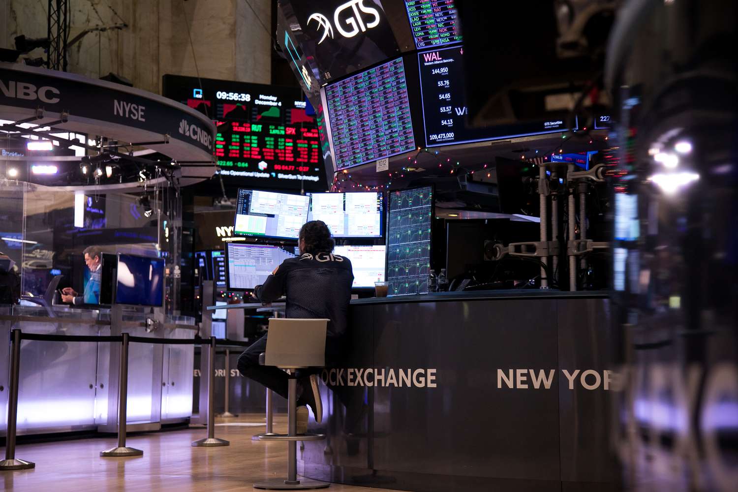 A trader works on the floor of the New York Stock Exchange (NYSE)/