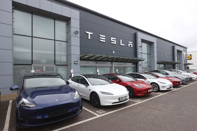 Cars on the forecourt of the Tesla dealership on the Boucher Road in Belfast. 