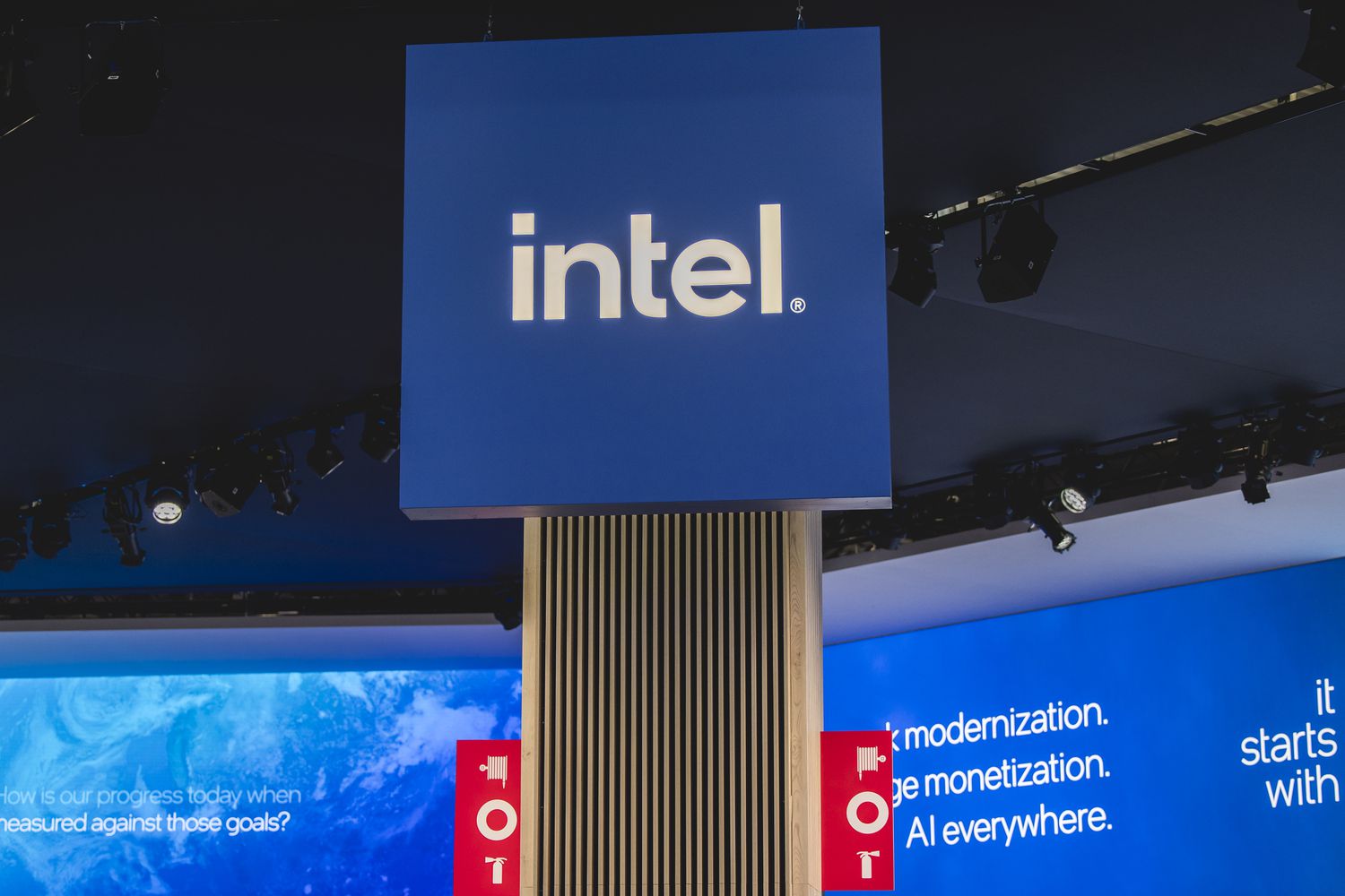 The Intel logo on display at a conference.