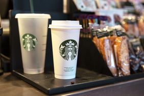 Starbucks cups and other goods at a Starbucks location.