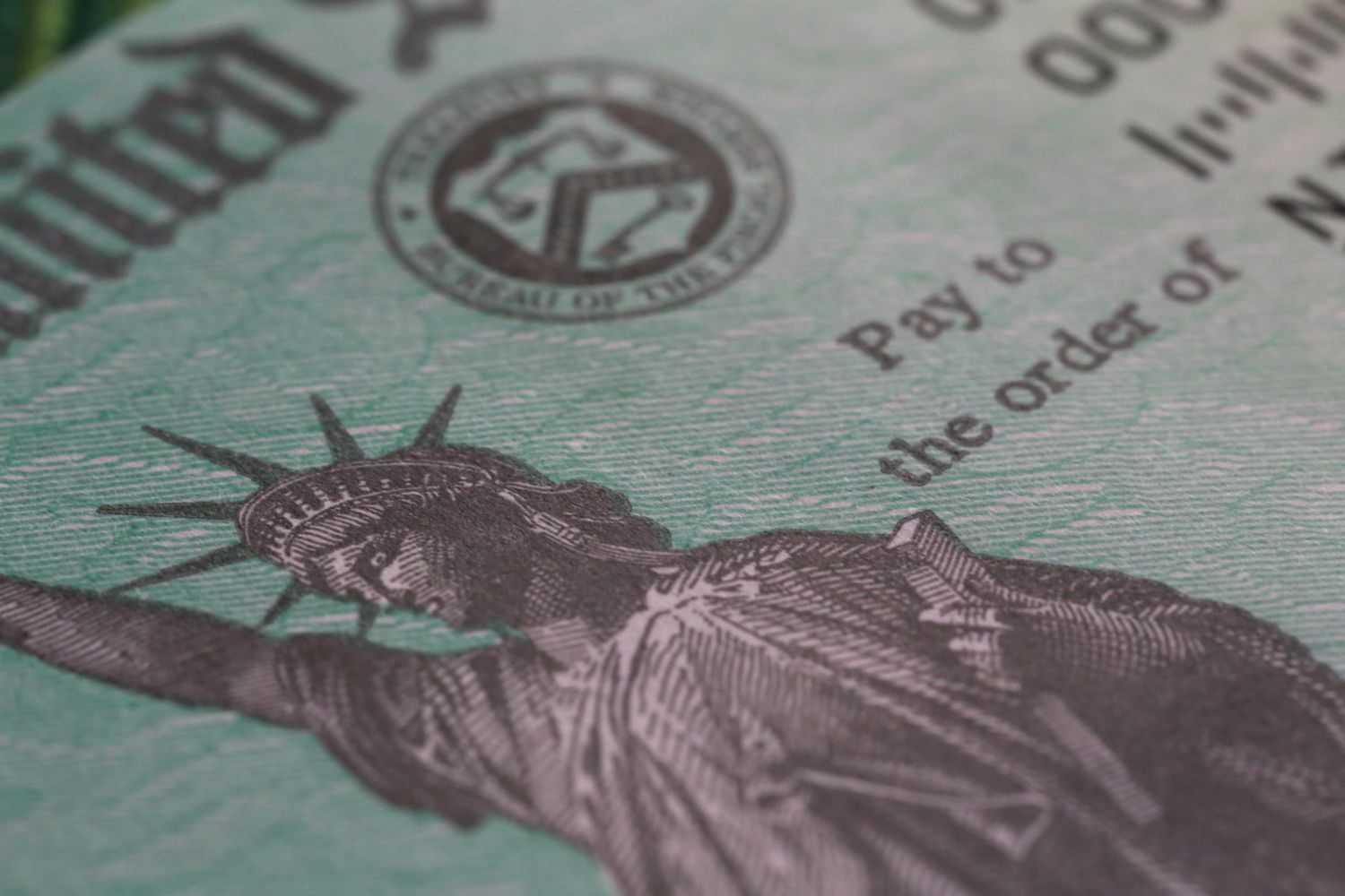 Closeup image of a U.S. Treasury Bill showing the Statue of Liberty.