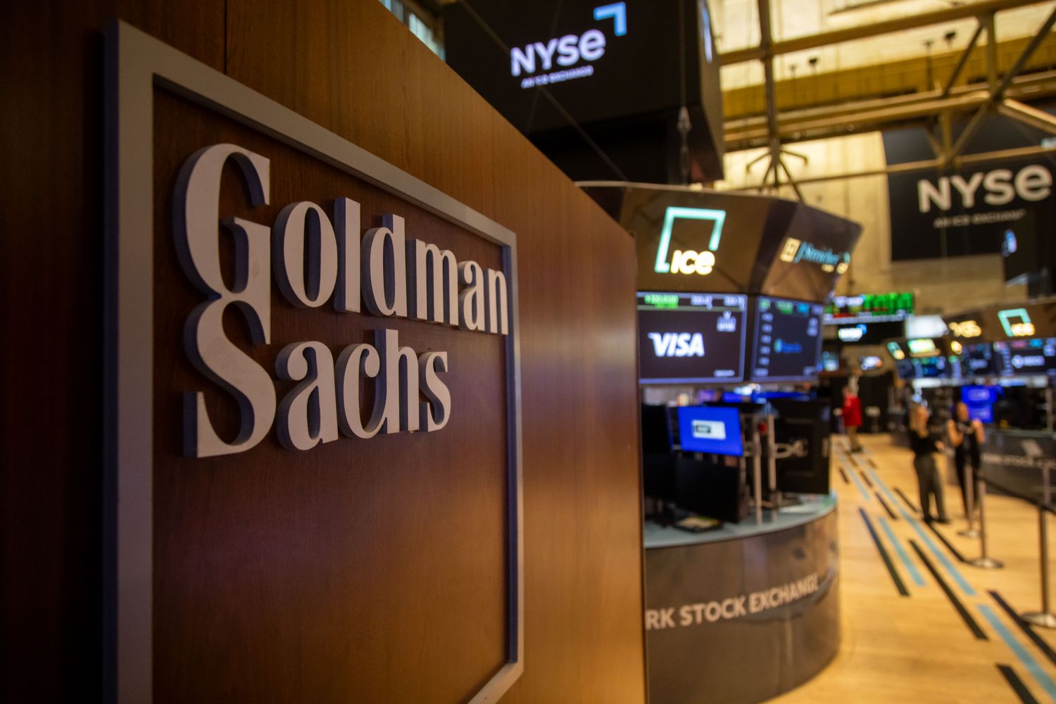 The Goldman Sachs logo is seen on the floor of the New York Stock Exchange.