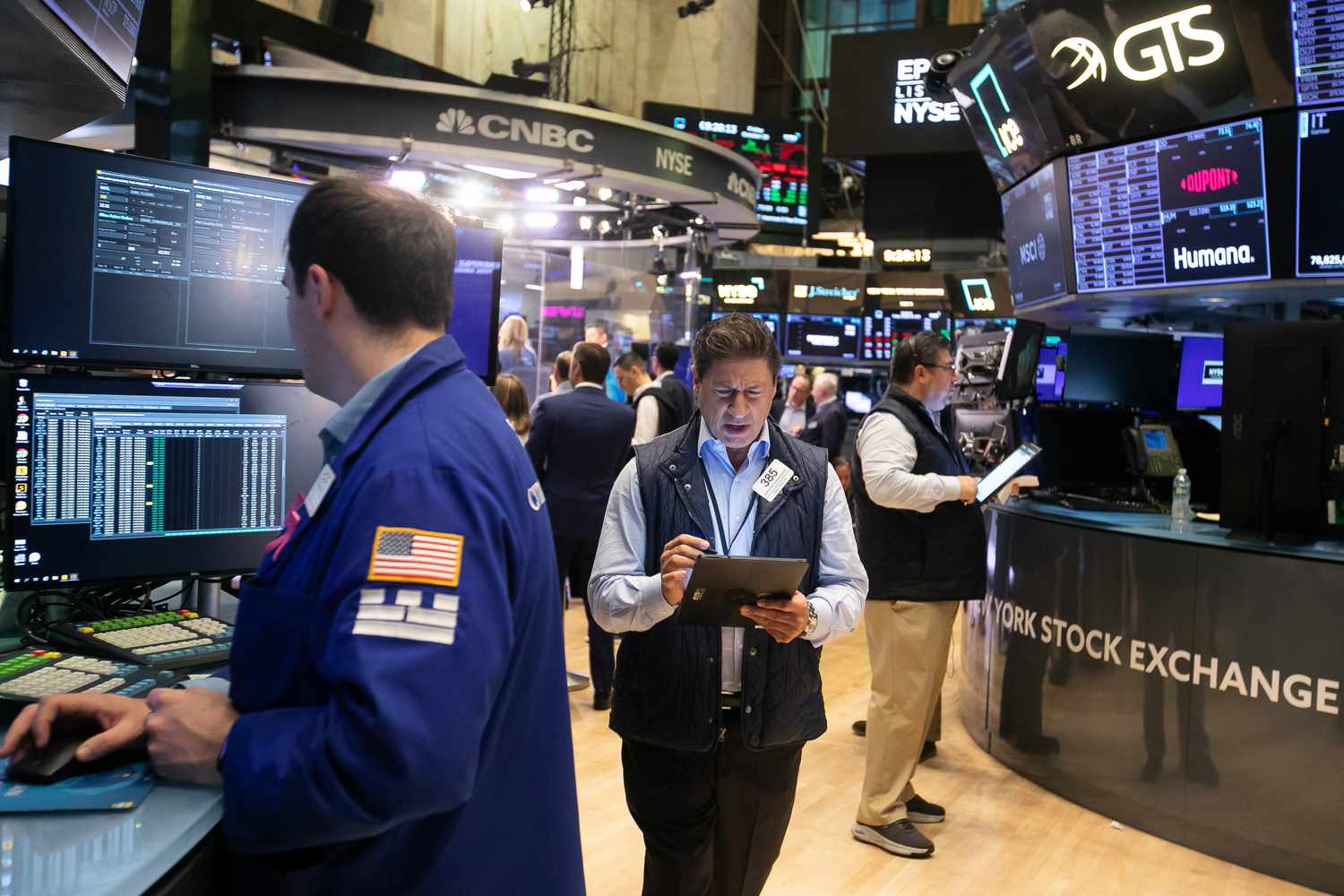 Traders work on the floor of the New York Stock Exchange.