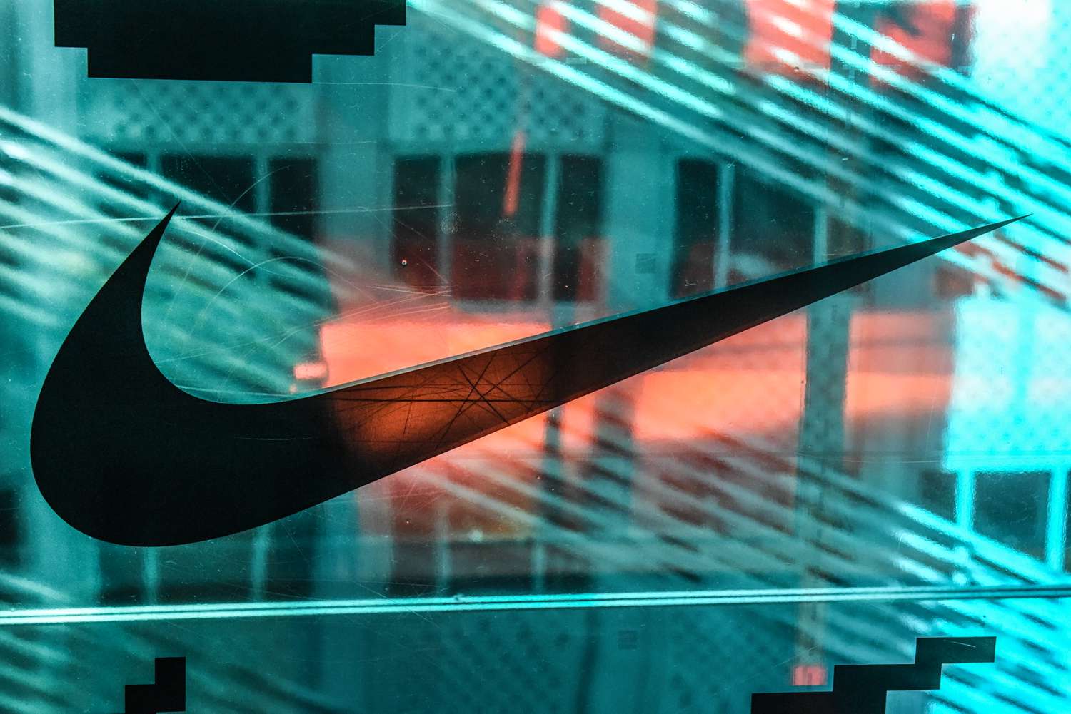 A Nike logo is seen at the Nike flagship store on 5th Ave. on December 20, 2019 in New York City.