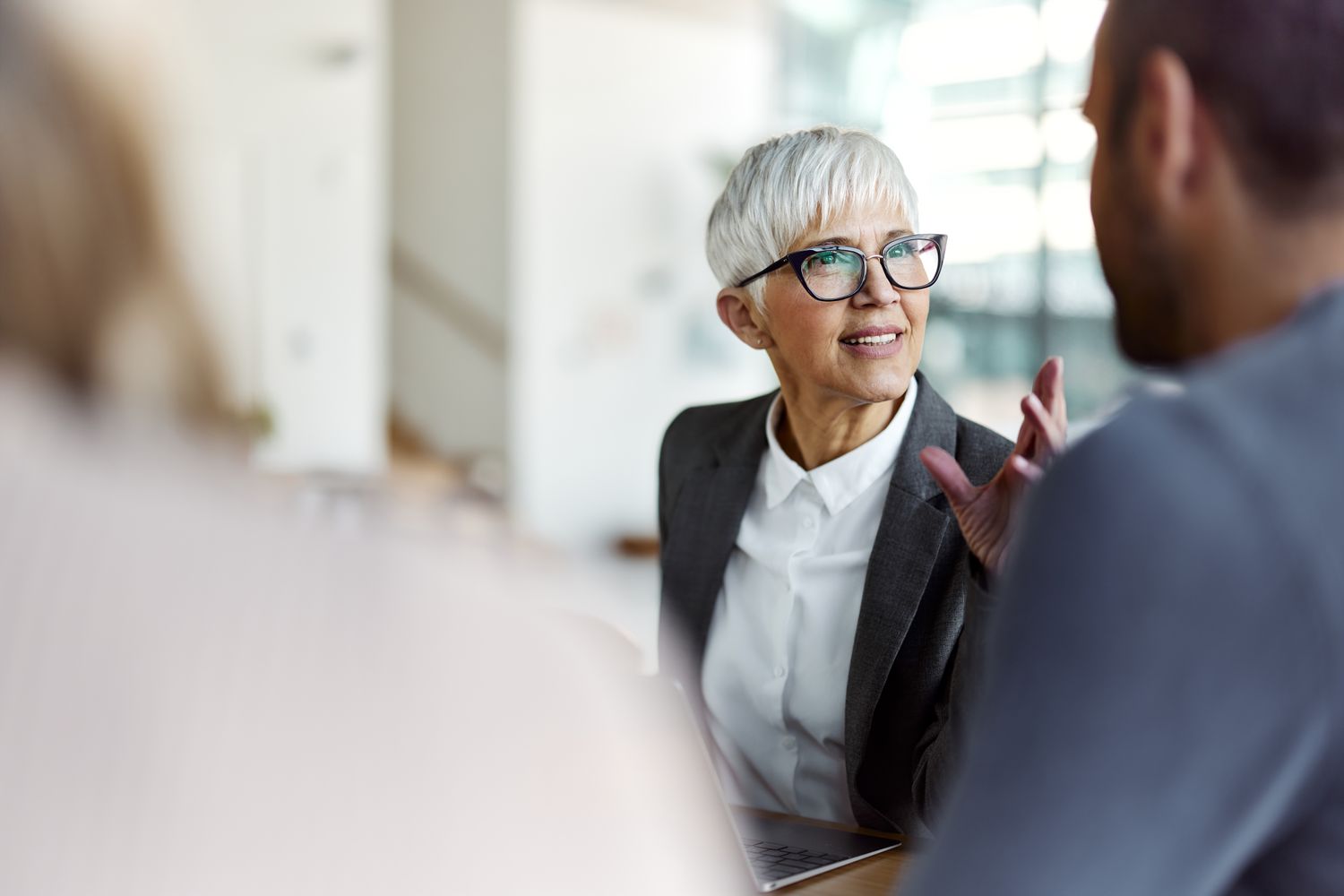 Lender explains to a couple how to get a $35,000 personal loan