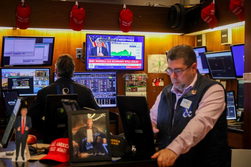 Television stations broadcast Jerome Powell, chairman of the US Federal Reserve, speaking after a Federal Open Market Committee (FOMC) meeting on the floor of the New York Stock Exchange (NYSE) in New York, US, on Wednesday, May 7, 2025. 