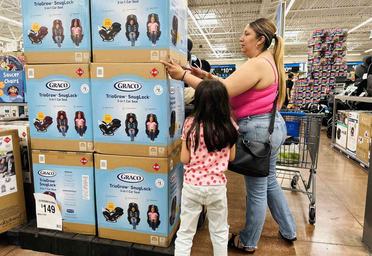 A woman shops for car seats, all made in China, at a Walmart in Rosemead, California, on April 11, 2025.