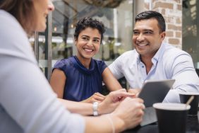 Financial advisor meeting with couple about CD rates