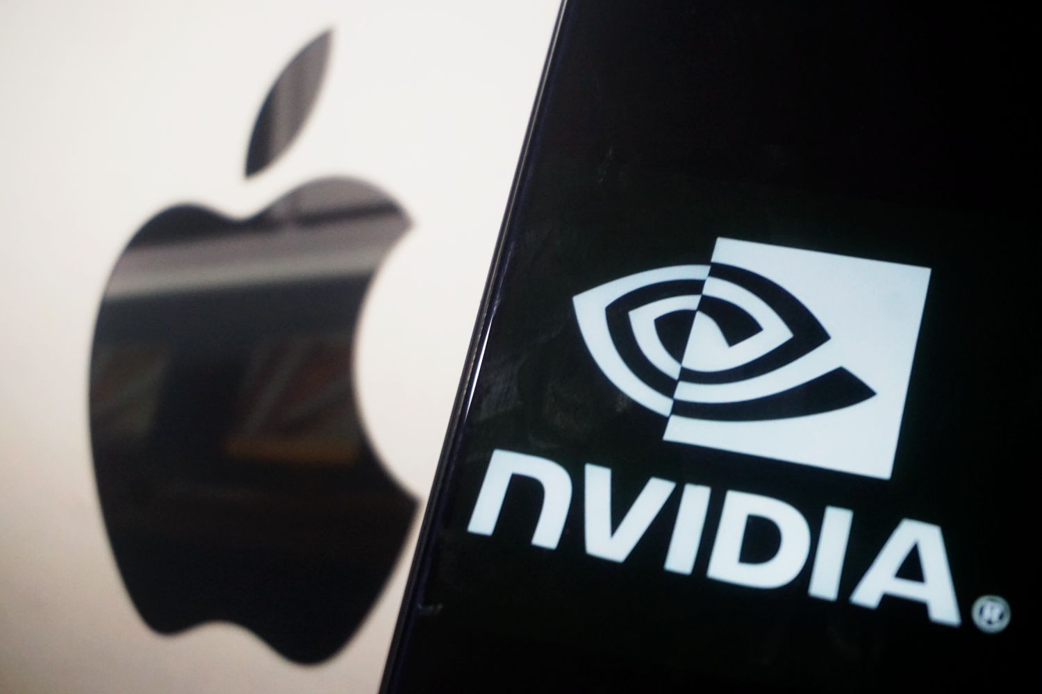 The Nvidia and Apple logos are seen side by side.