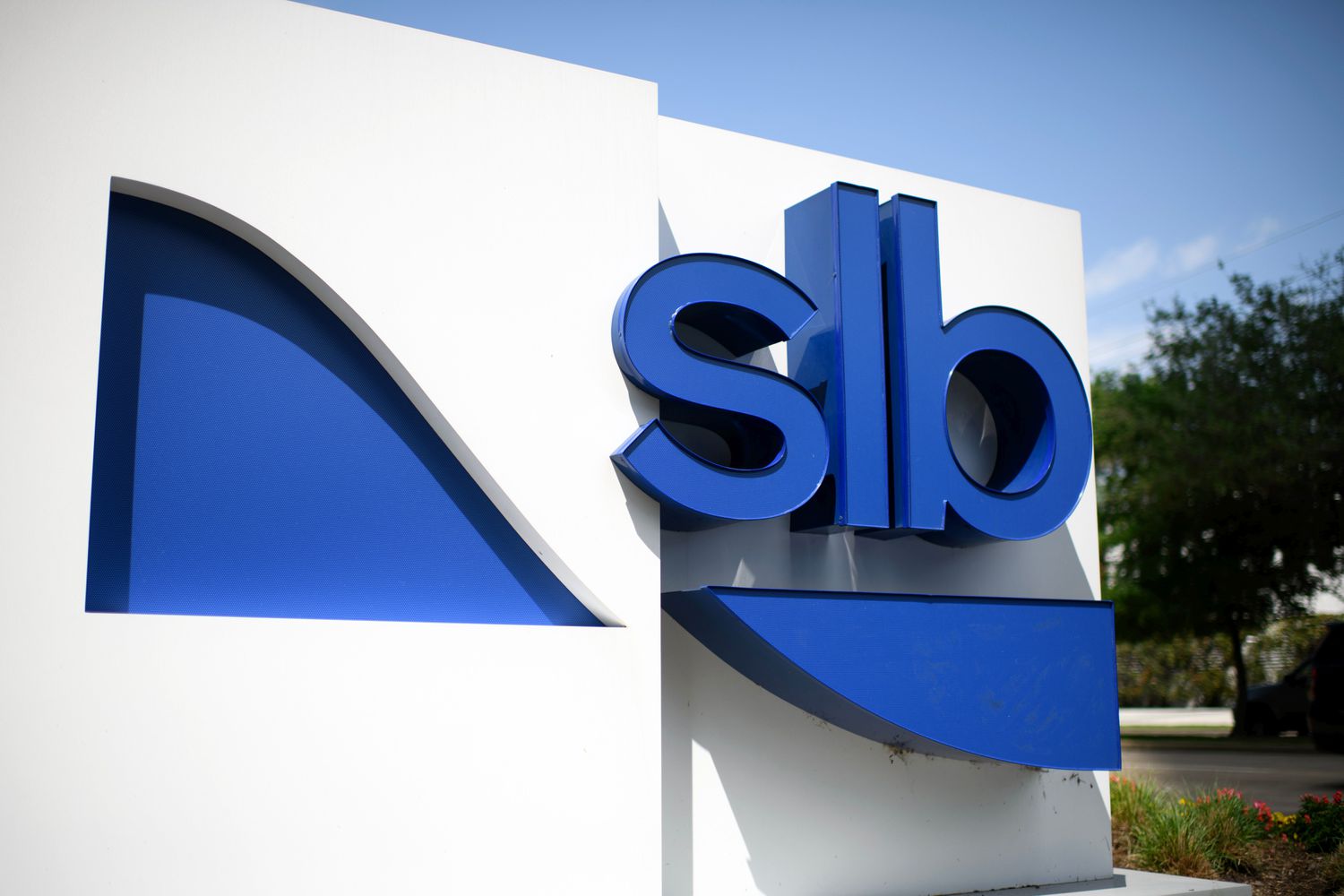SLB logo on a sign in front of the company's headquarters in Houston
